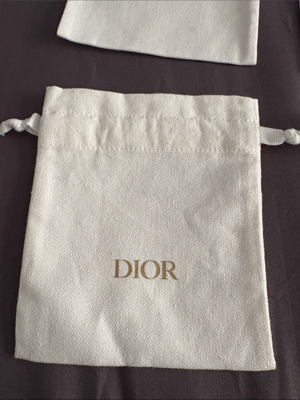 Dior Cream Drawstring Pouch with Gold Logo